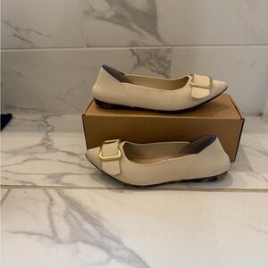 Rothy’s Cream Flats with Buckle Detail
